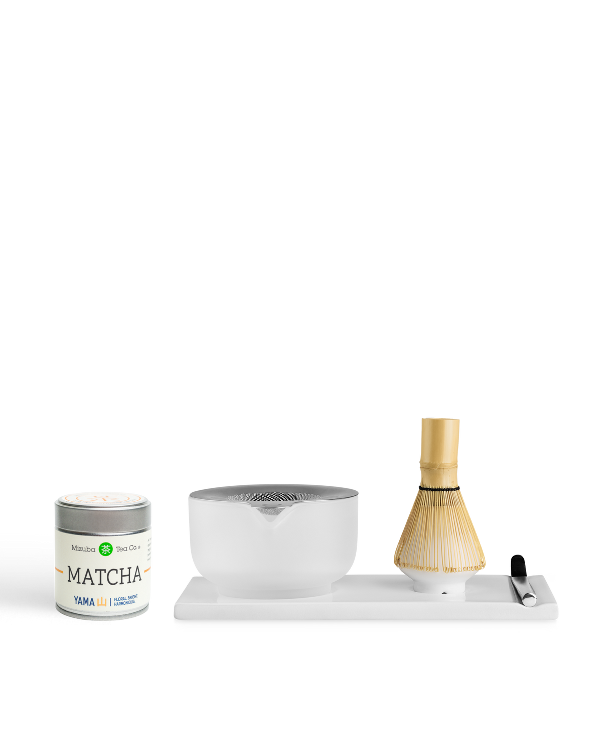 Fellow x Yama Matcha Set: tin, bamboo whisk, spoon, and ceramic bowl on a tray by Fellow.